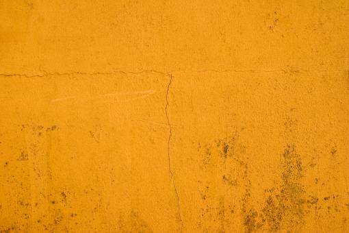 Free Stock Photo of Cracked Yellow Stone Wall Texture