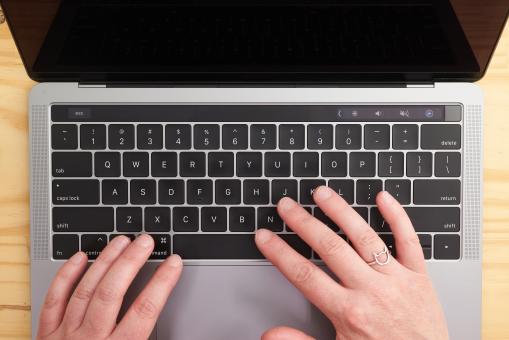 Free Stock Photo of Hands typing laptop