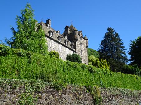 Free Stock Photo of Impressing castle with volcanic stones and schiste tiles