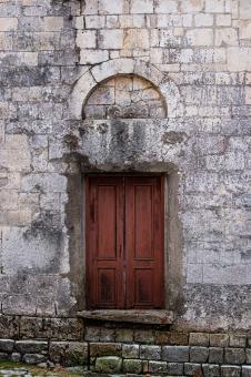 Free Stock Photo of  old door in a stone wall