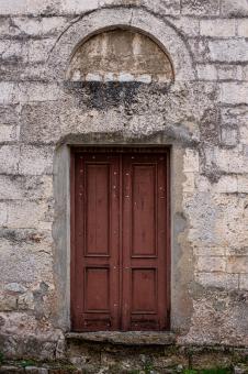 Free Stock Photo of  old door in a stone wall