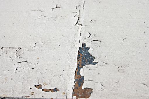 Free Stock Photo of White surface with cracks and pealed pai