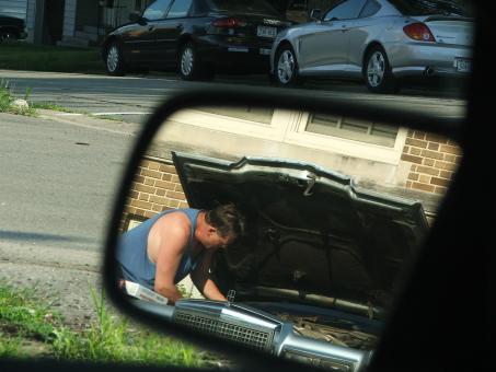 Free Stock Photo of Man fixing Car
