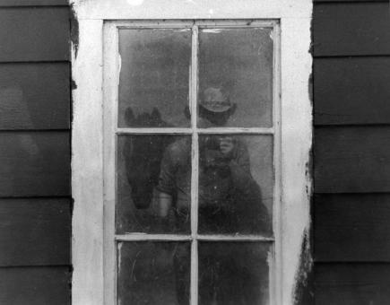 Free Stock Photo of Photographer in the window