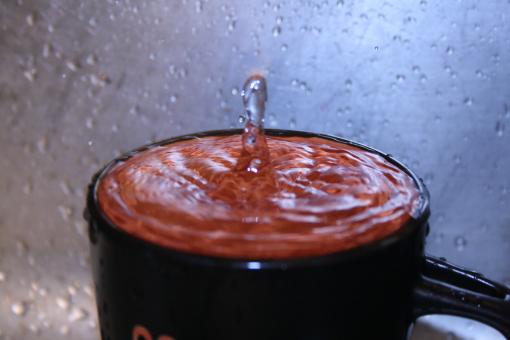 Free Stock Photo of Full Cup of Water - Splashing Drops