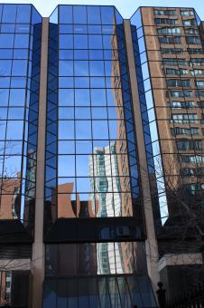 Free Stock Photo of Reflection of a building in a building
