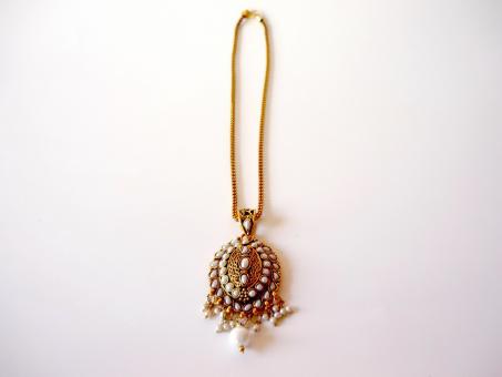 Free Stock Photo of Golden Necklace