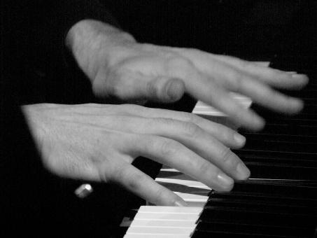 Free Stock Photo of Playing the Piano - Black and White