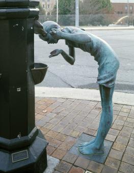 Free Stock Photo of Sculpture Drinking Water