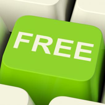 Free Stock Photo of Free Computer Key In Green Showing Freebie and Promo