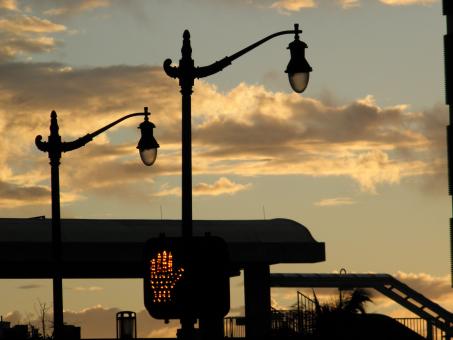 Free Stock Photo of Vintage Light Poles with Cloudy Sky