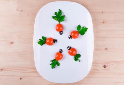 Free Stock Photo of Baby Tomatoes on a White Plate