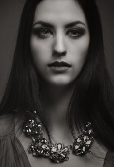 Free Stock Photo of Dark Haired Woman with Necklace