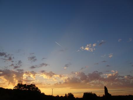 Free Stock Photo of Few yellow and orange clouds before the deep blue sky
