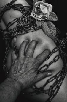 Free Stock Photo of Hand on Chained Body - Black and White