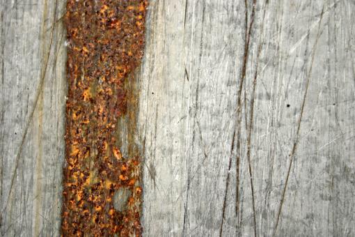 Free Stock Photo of Rusted and Scratched Metal