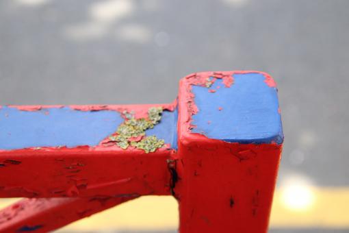 Free Stock Photo of Peeled red paint on fence