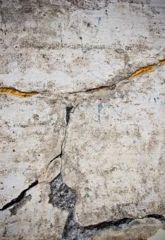 Free Stock Photo of Cracked Stone Wall Background