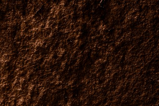Free Stock Photo of Dark Bumped Rock Surface