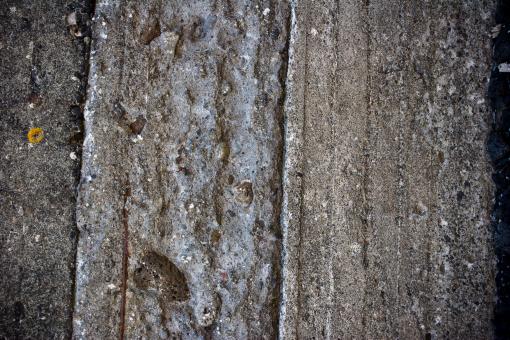 Free Stock Photo of Old Worn Cement Block