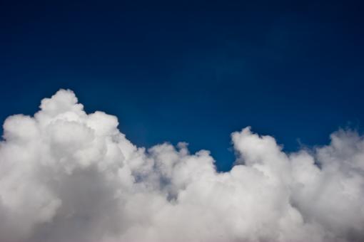 Free Stock Photo of White Puffy Clouds on Blue