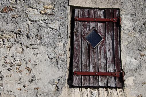Free Stock Photo of Rusted and abandoned window wood shutter