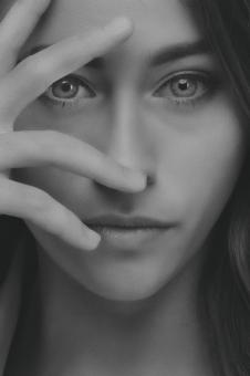 Free Stock Photo of Woman Portrait - Fingers in front of Face