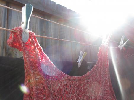 Free Stock Photo of Wet clothes hanging on laundry line in sunshine