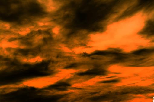 Free Stock Photo of Orange sky with dark clouds
