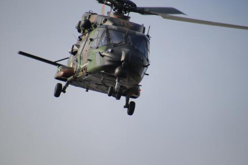 Free Stock Photo of Army helicopter flying away