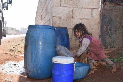 Free Stock Photo of Poor Girl Getting Water