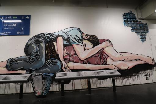 Free Stock Photo of Graffiti of couple sleeping on a bench