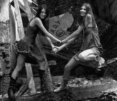 Free Stock Photo of Two Girls Holding Hand - Black and White