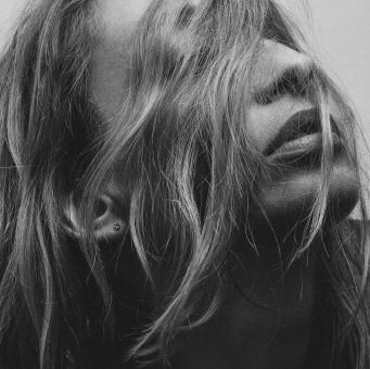 Free Stock Photo of Girl with Hair Covered Face - Black and White