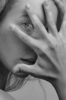 Free Stock Photo of Model with Hand in front of Face