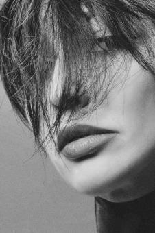 Free Stock Photo of Portrait of Girl with Hair Covered Face - Black and White