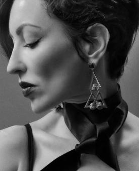Free Stock Photo of Girl Posing with Earrings - Black and White Portrait