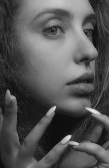 Free Stock Photo of Face and Fingernails - Monochrome Girl Portrait
