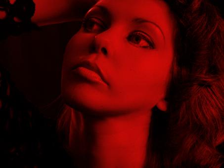 Free Stock Photo of Woman Portrait in Monochrome Red