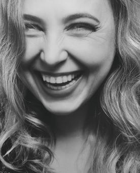 Free Stock Photo of Pretty Girl Laughing - Black and White Portrait
