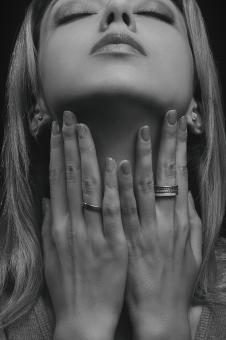 Free Stock Photo of Girls with Hands on Neck - Black and White Portrait