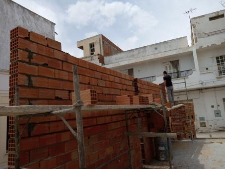 Free Stock Photo of Constructing a Brick Wall