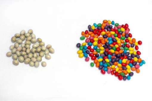 Free Stock Photo of White and colorful candy scattered