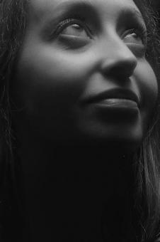 Free Stock Photo of Black and White Portrait of a Girl Looking Up