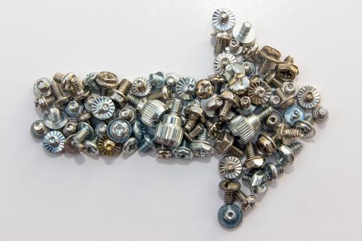 Free Stock Photo of Screws and bolts forms an arrow