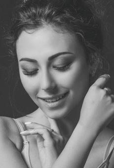 Free Stock Photo of Smiling Brunette Model - Black and White
