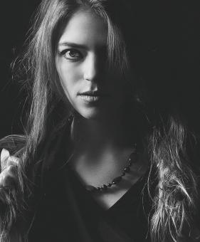 Free Stock Photo of Female Portrait - Dark Shadows - Monochrome