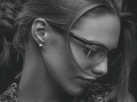 Free Stock Photo of Portrait of Girl with Glasses - Black and White