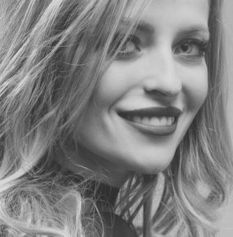 Free Stock Photo of Smiling Woman Portrait in Black and White