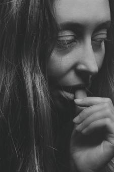 Free Stock Photo of Deep Though - Monochrome Female Portrait
